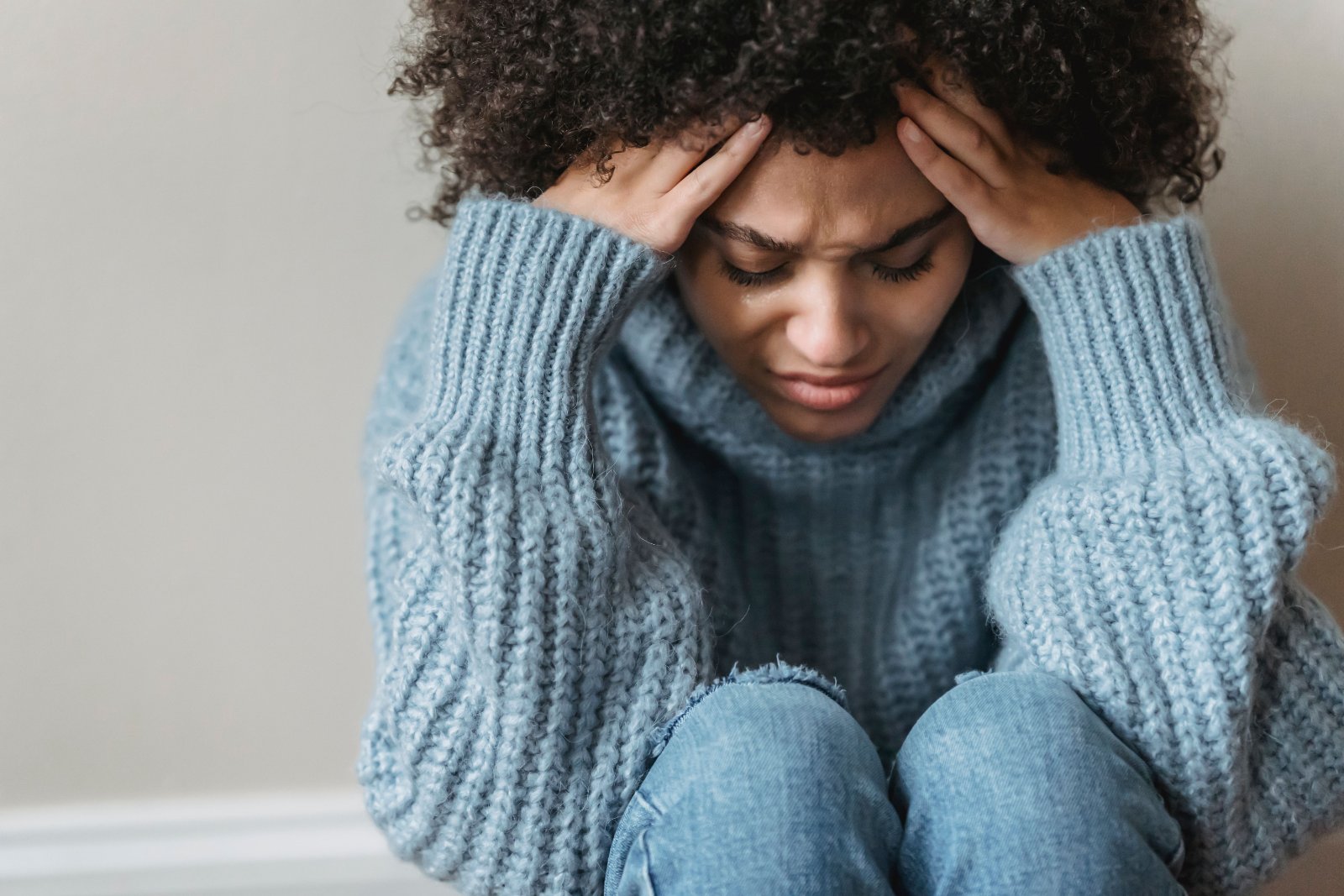 A woman practicing mindfulness in a serene environment.