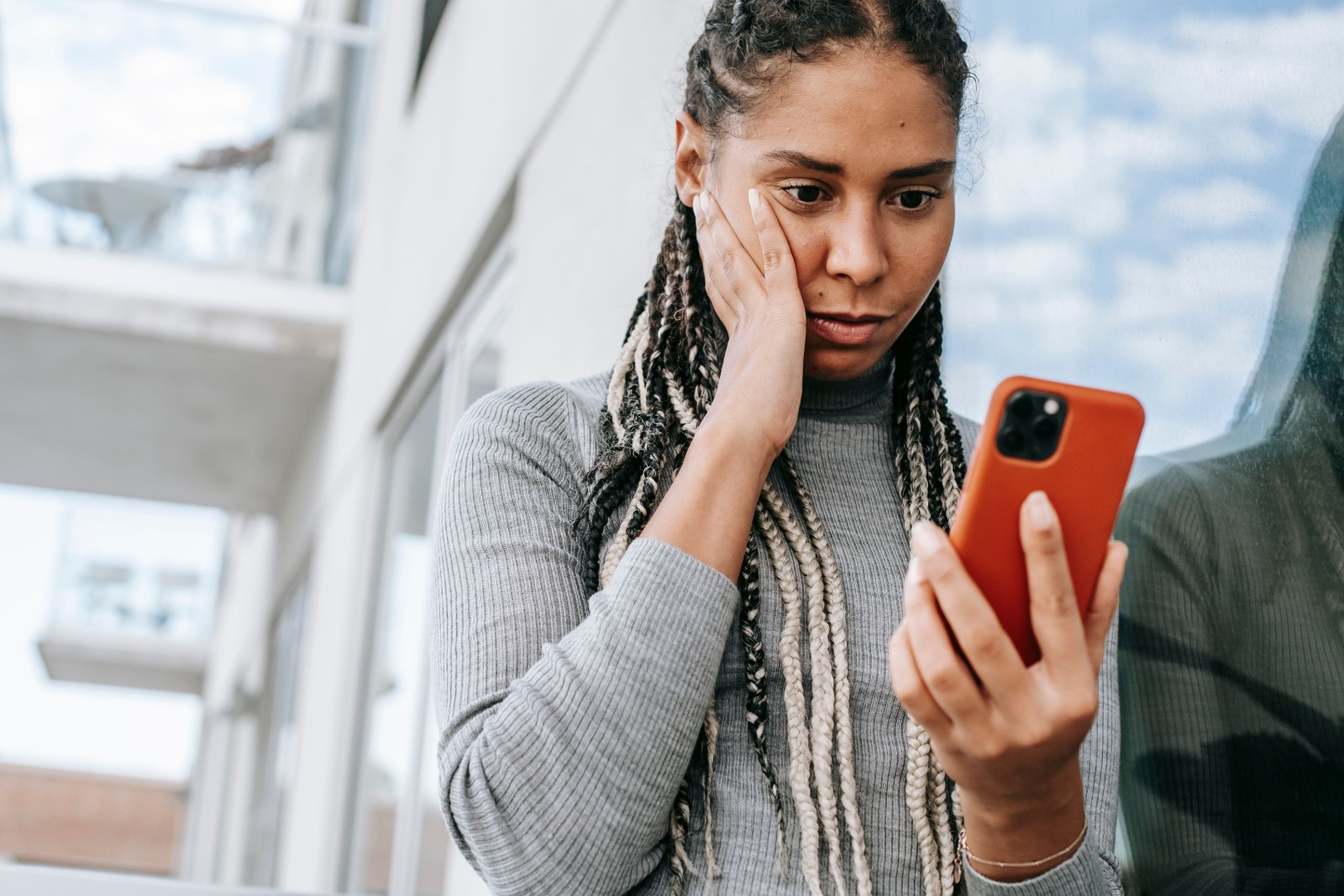 Black woman reflecting on her emotions