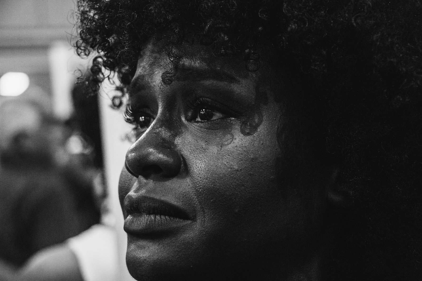 Black woman speaking with a Black female mental health professional