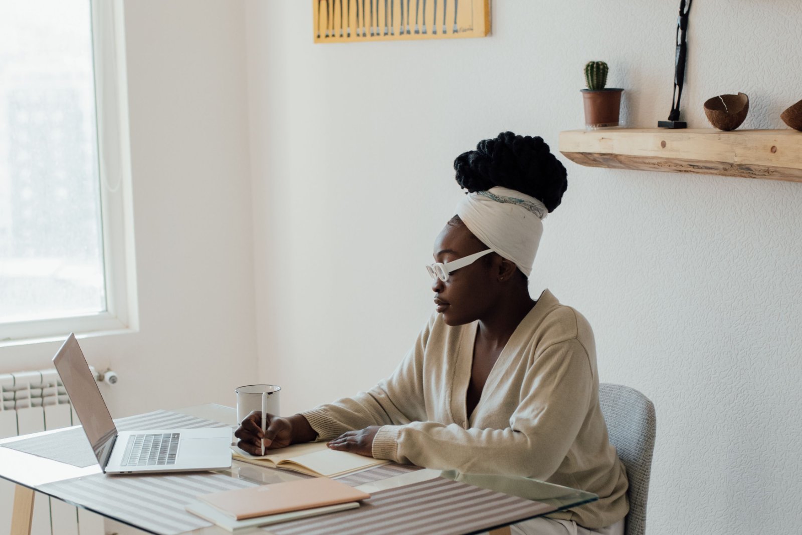 A peaceful setting with a Black woman resting.