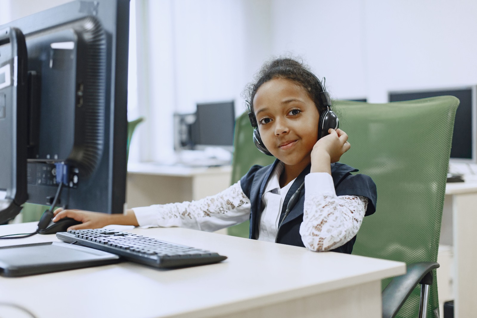 Black girl listening attentively in class
