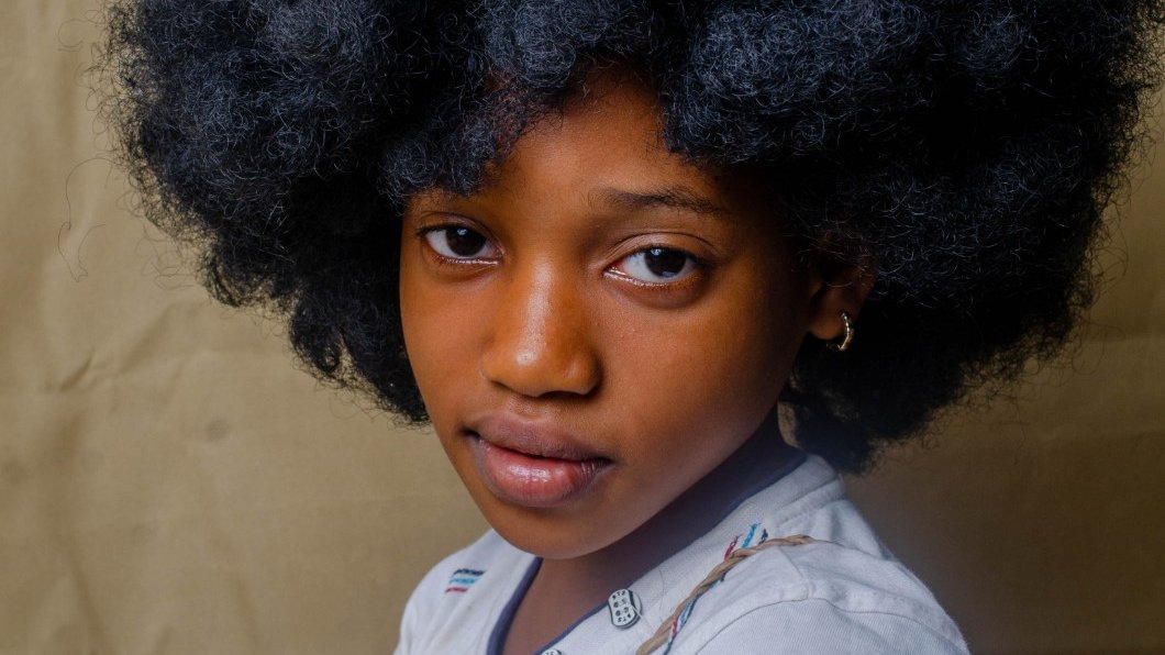 Black girls embracing their natural hairstyles