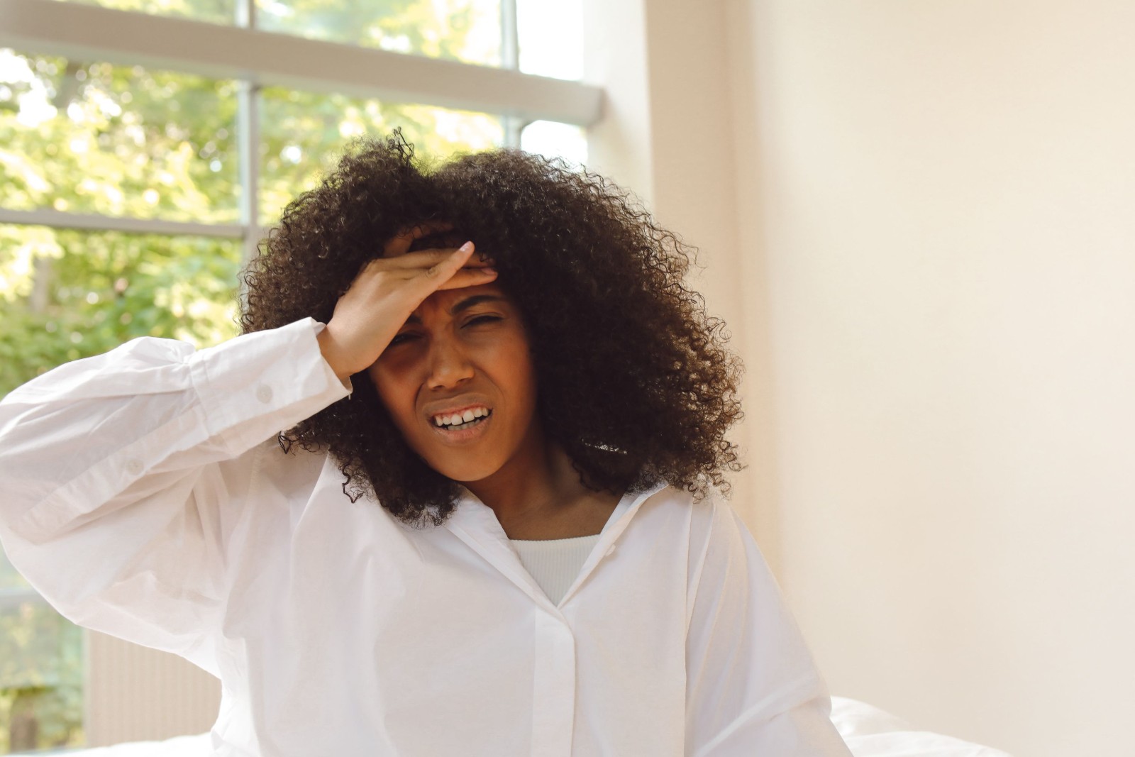 A thoughtful Black girl reflecting on her feelings